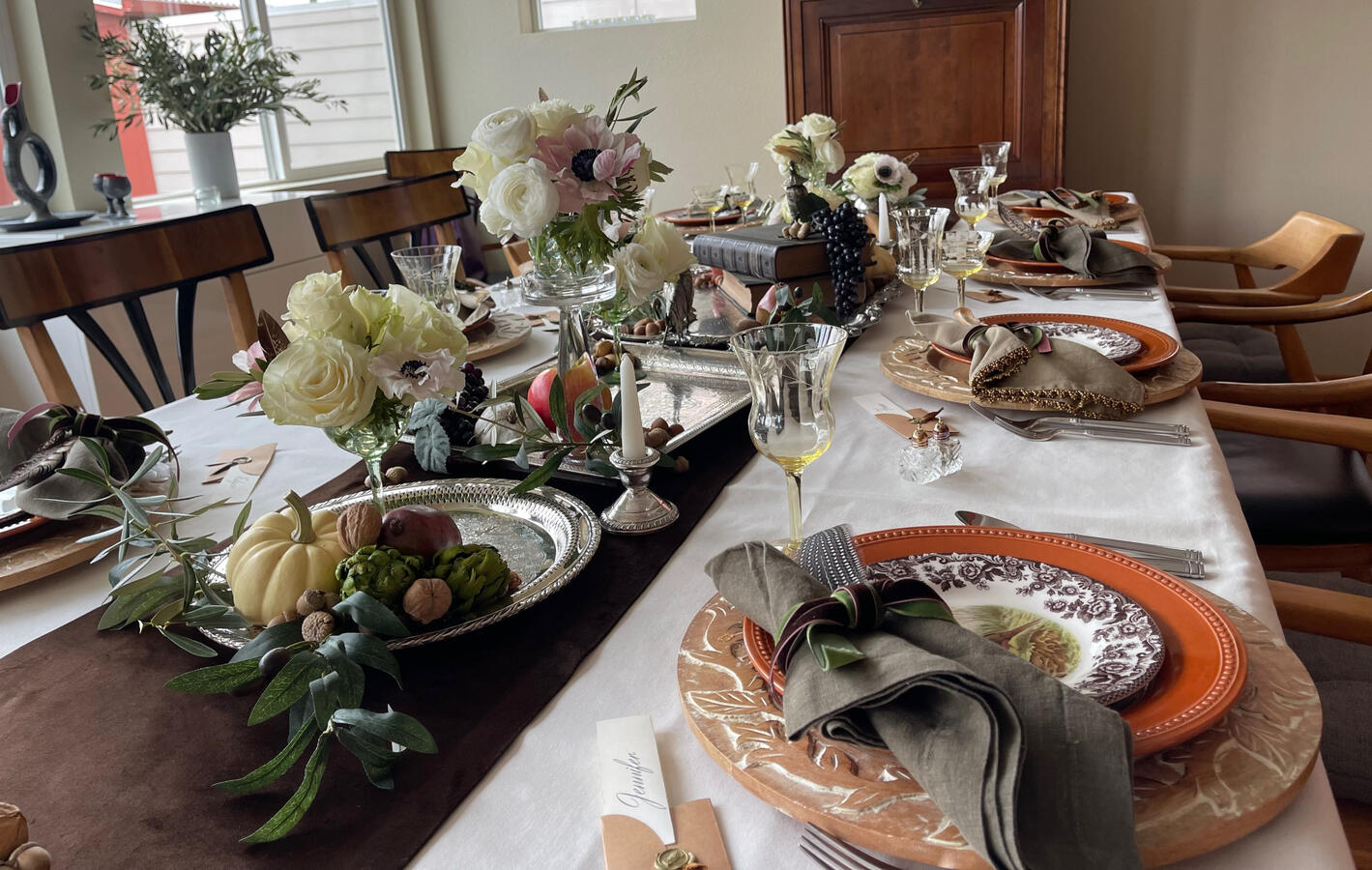 Spode Woodland paired with warm earthenware and layered vintage silver creates a harvest table rich in texture and detail. Trays, candlesticks, and gathered objects bring a sense of abundance while keeping the setting grounded and inviting.